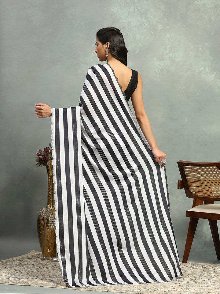 Stripes Printed &amp; Embellished Satin Saree