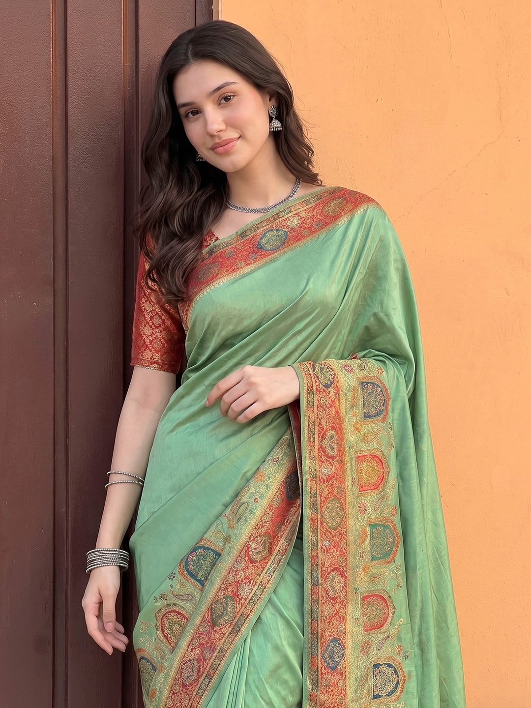Pista Green Dola Silk Woven Saree