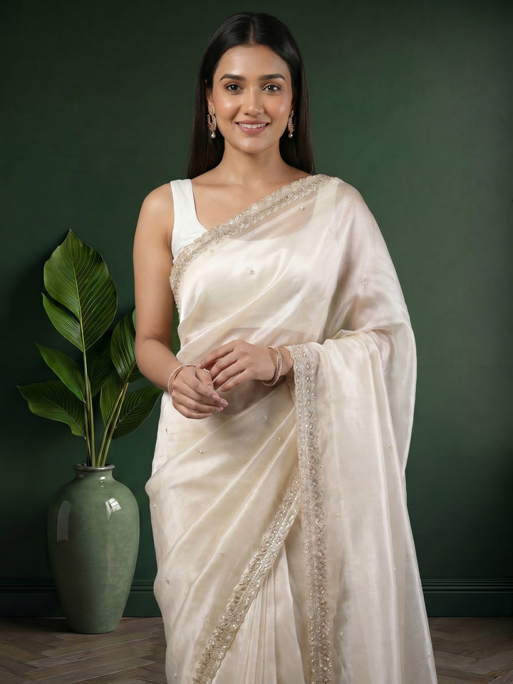 Cream Embroidered Tissue Saree