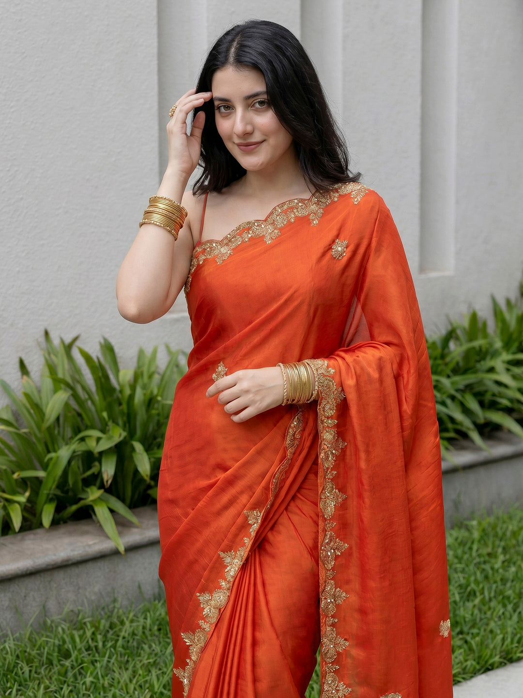 Orange Embroidered Chinon Saree