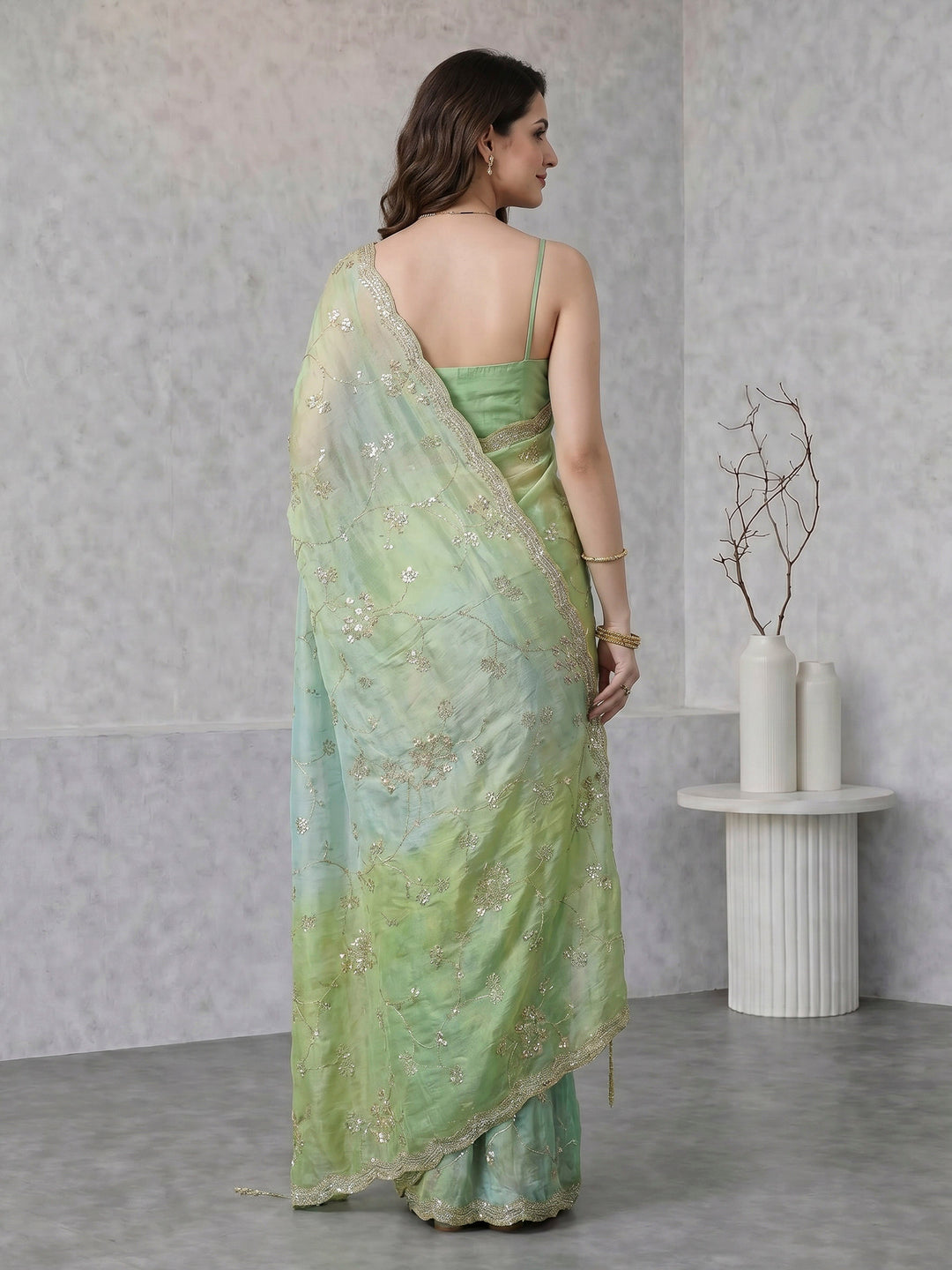 Pista Green Embroidered Tissue Saree