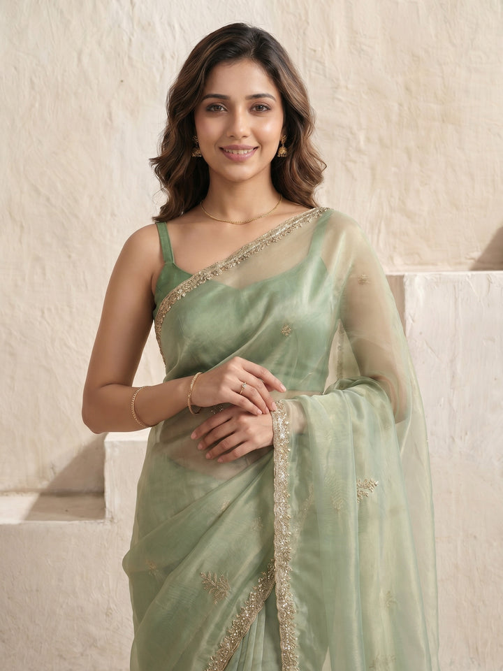Pista Green Embroidered Tissue Saree