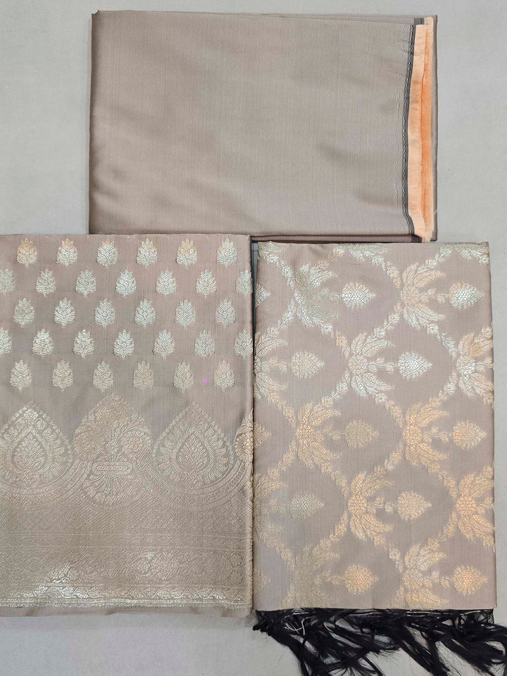 Beige Art Silk Woven Design Unstitched Dress Material