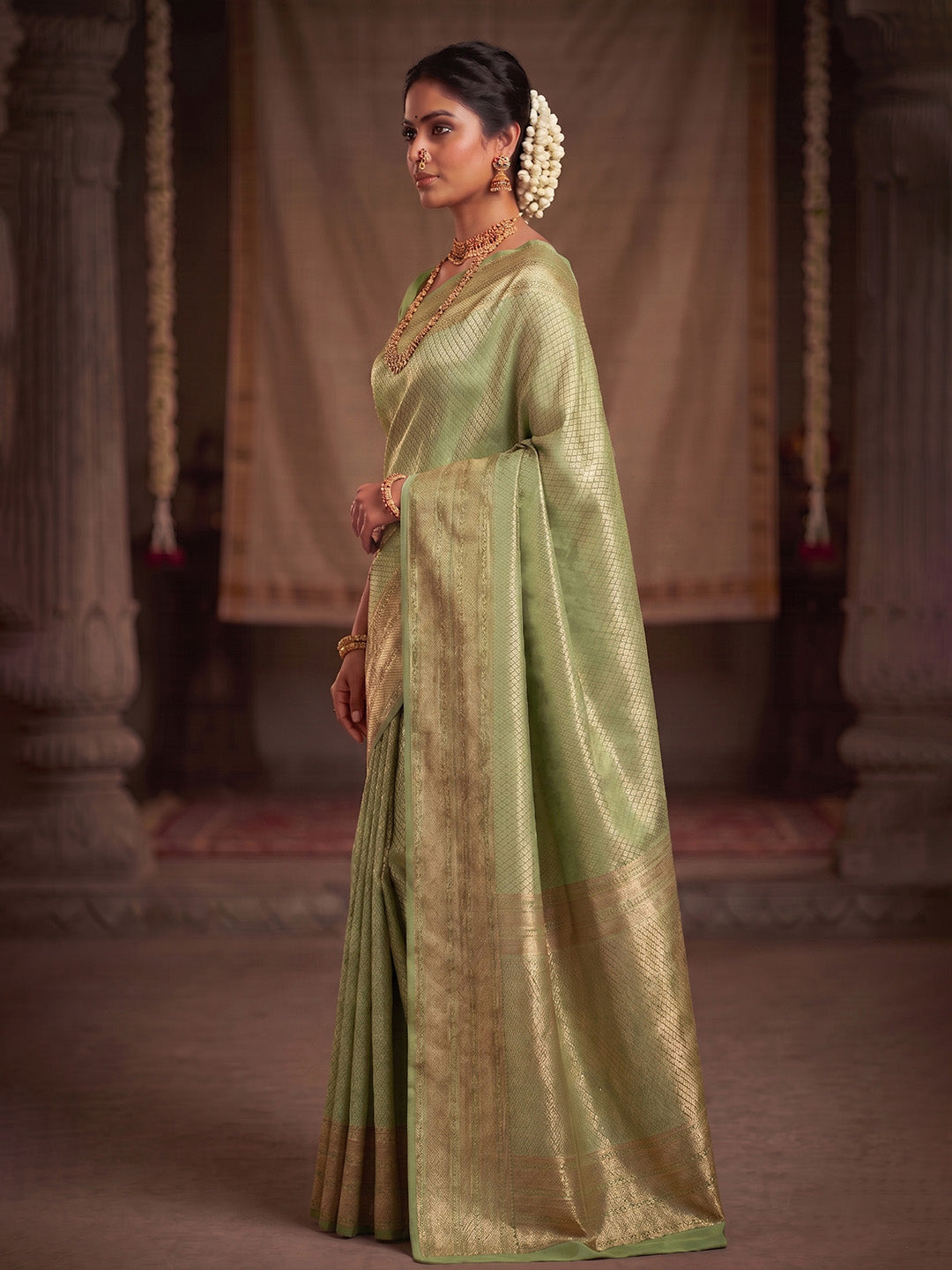 Pista Green Woven Design Art Silk Kanjivaram Saree