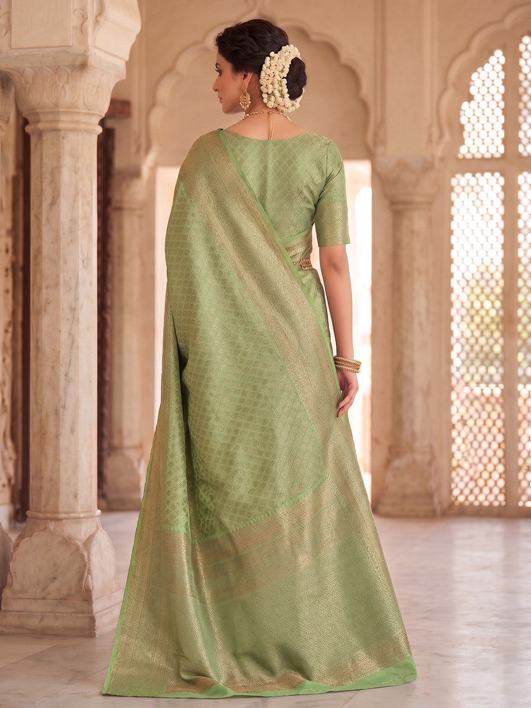 Pista Green Woven Design Art Silk Kanjivaram Saree