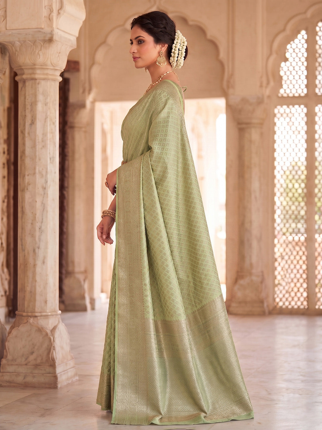 Pista Green Woven Design Art Silk Kanjivaram Saree