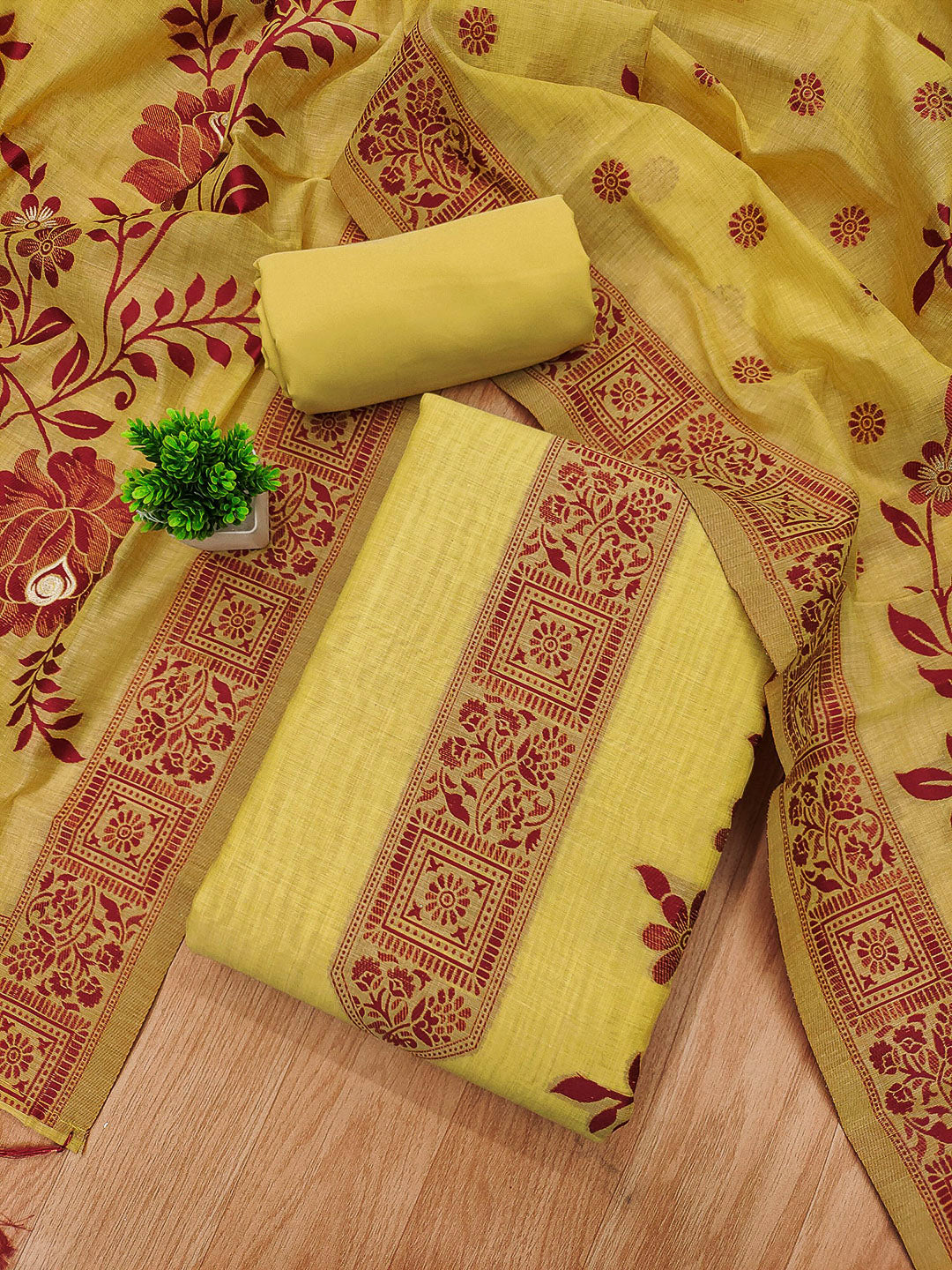 Yellow Muga Cotton Woven Design Unstitched Dress Material