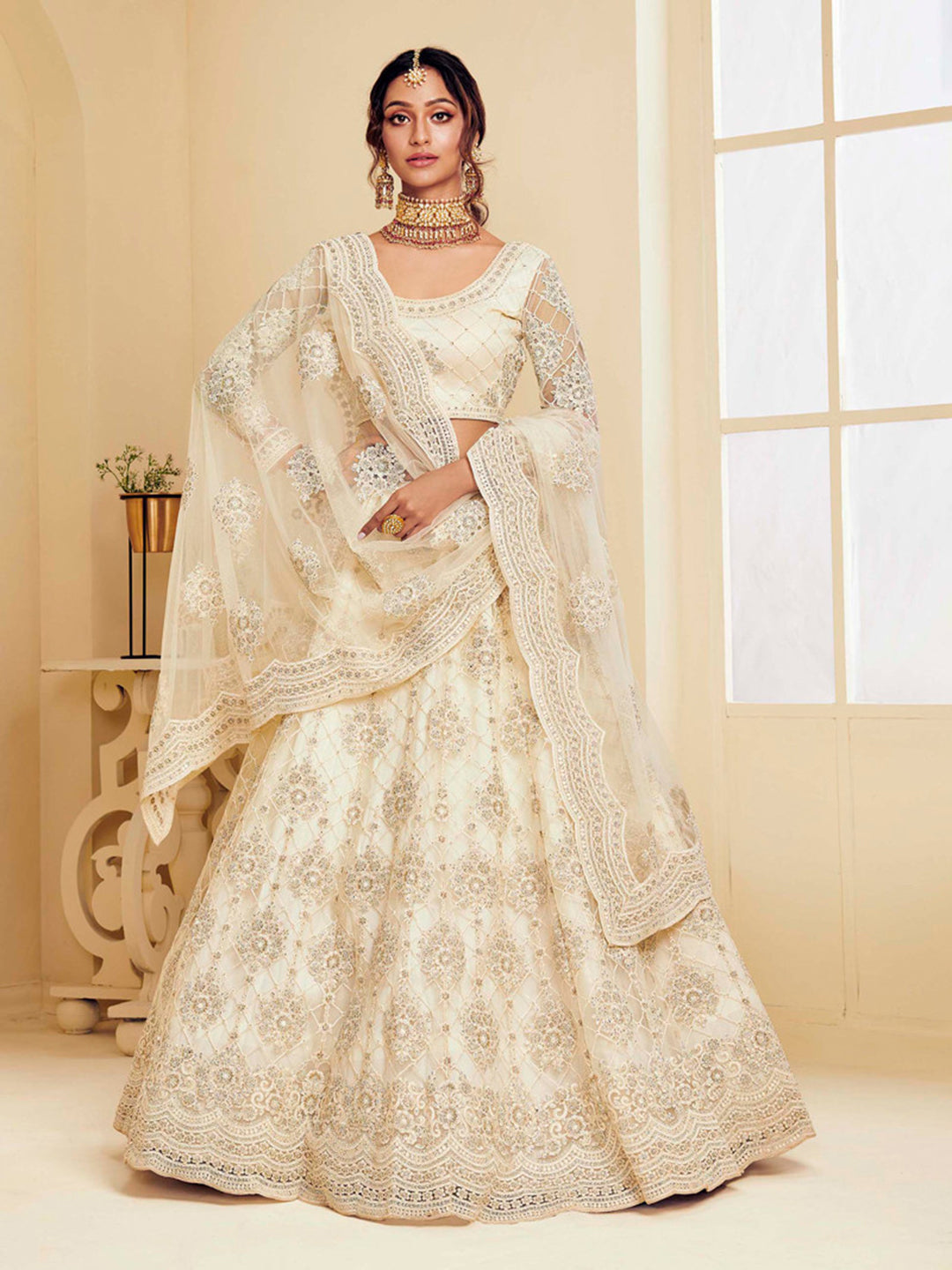 Off White Embroidered Net Semi Stitched Blouse Lehenga &amp; Dupatta