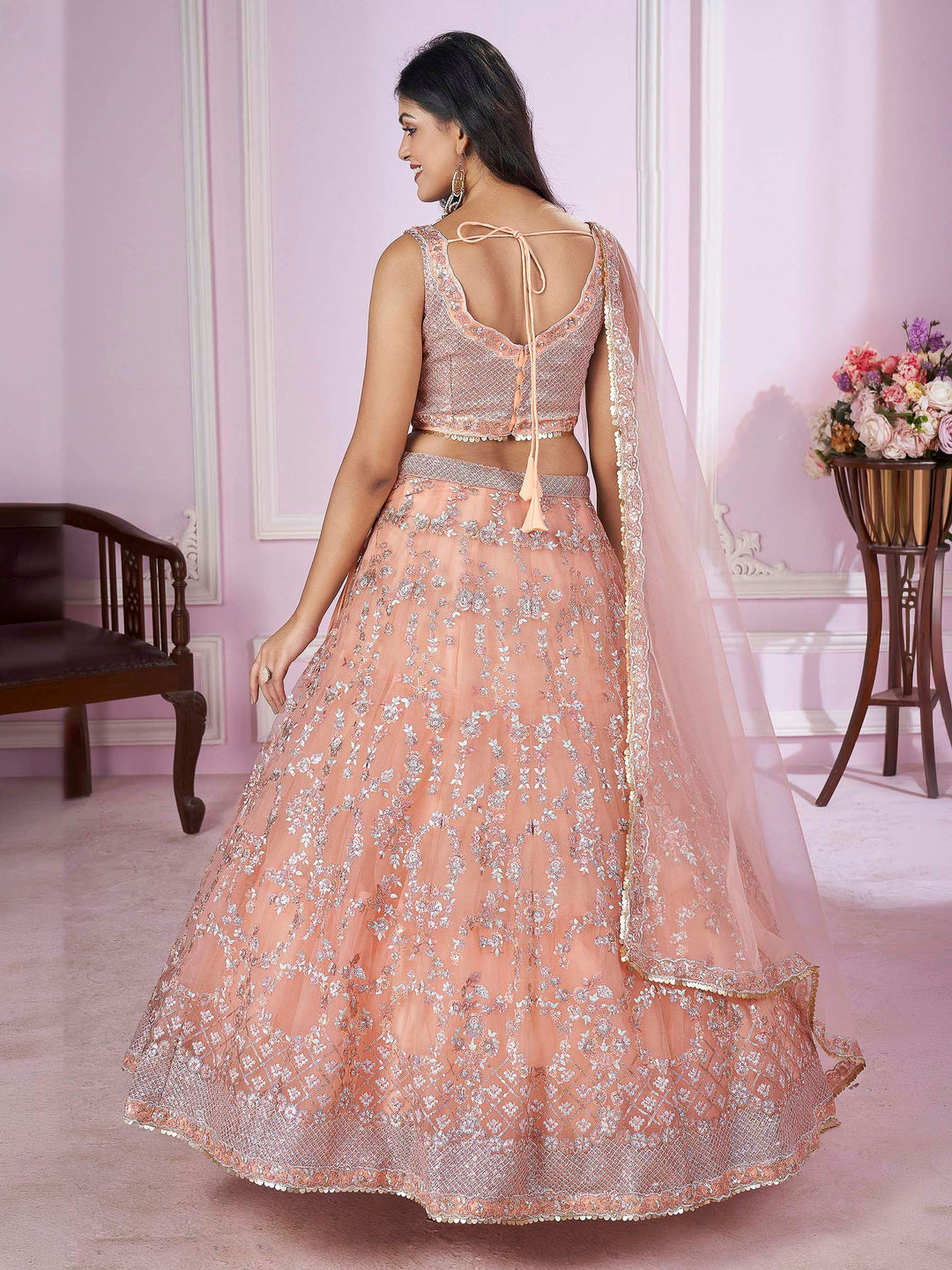 Peach Net Embroidered Semi Stitched Lehenga Choli with Dupatta