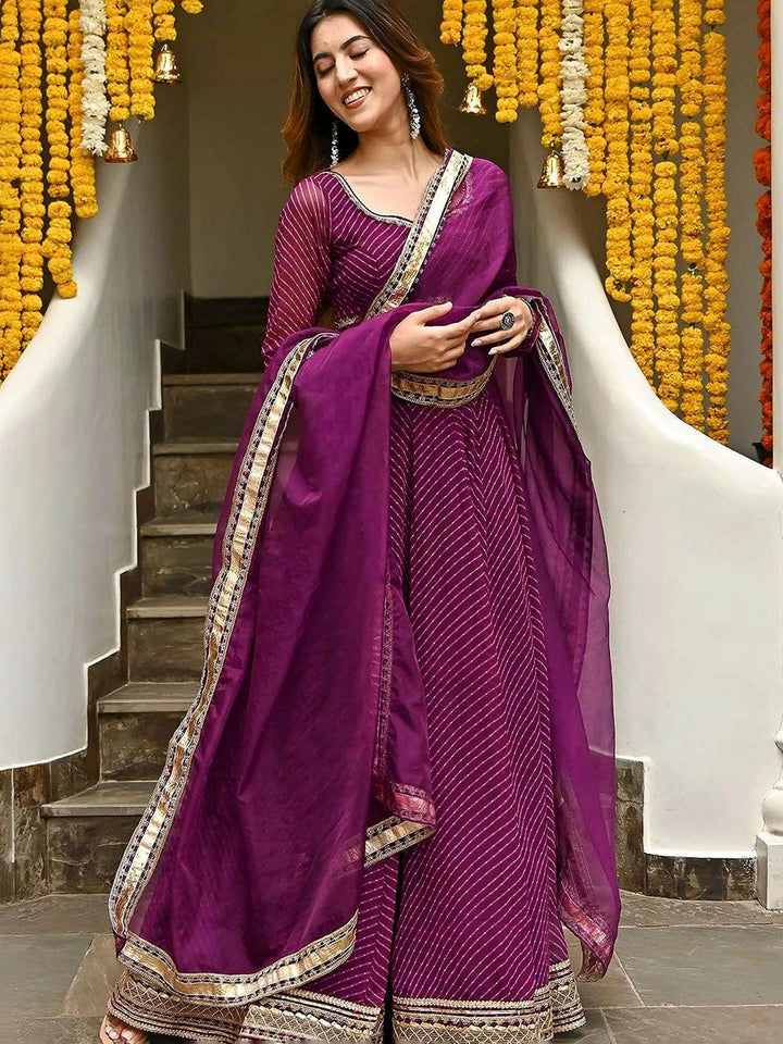 Purple Georgette Embroidered Semi Stitched Lehenga Choli with Dupatta