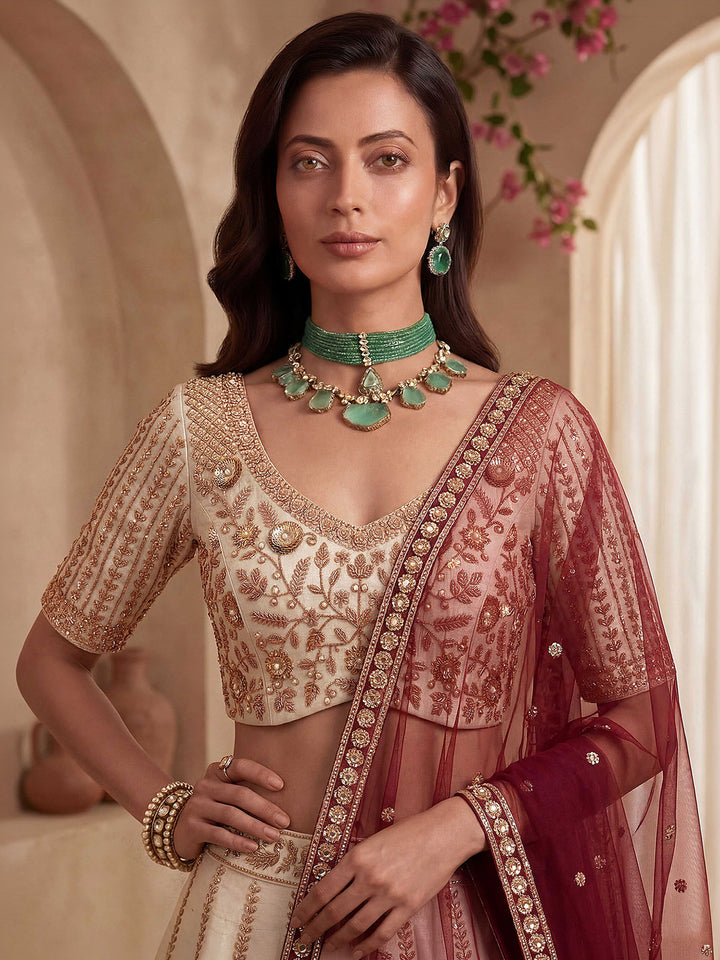 Off White Hlame Semi Stitched Bridal Lehenga Choli with Embroidered Net Dupatta