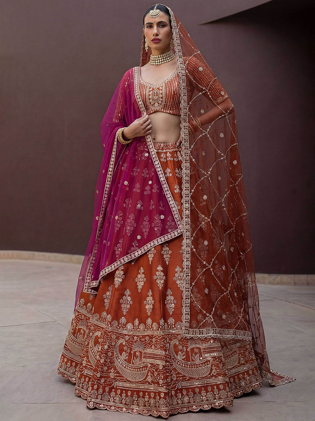 Orange Hlame Semi Stitched Bridal Lehenga Choli with Embroidered Net Dupatta
