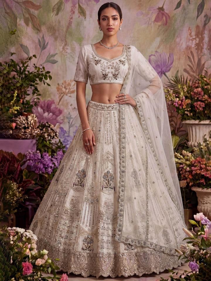 Off White Net Semi Stitched Bridal Lehenga Choli with Embroidered Net Dupatta